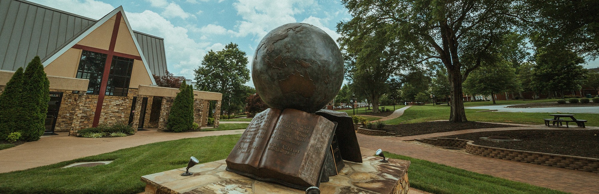 Globe statue in front of the NGU Prayer Chapel